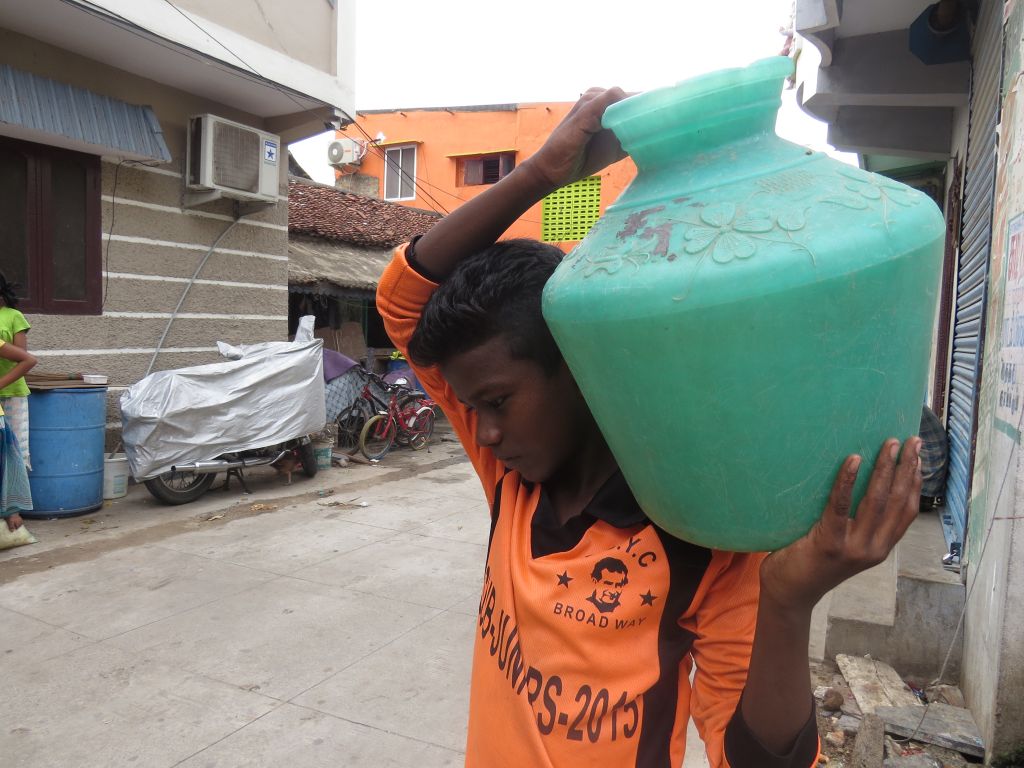 Child Carrying Water